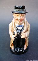 Front view of glazed ceramic Winston Churchill toby jug