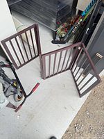 Gate fully extended showing four panels and hinges