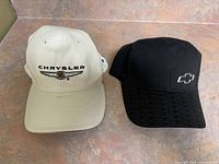Front view of both caps side by side
