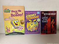 Front covers of all three paperback books
