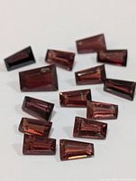 All loose amethyst stones spread for visibility of shapes and facets