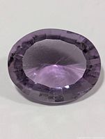 Front view of loose oval amethyst gemstone