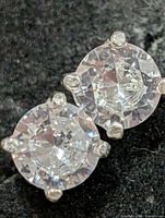 close-up front view of CZ stones in prong settings