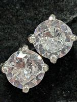 Front view of both earrings showing stones and prongs