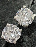 front view of both earrings showing stones and prongs