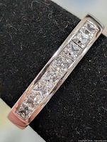 Ring angled view showing channel-set stones