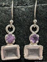 front view of both earrings showing gemstones and silver hooks