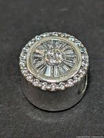 Bead charm top view showing CZ arrangement and silver finish