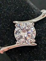 close-up of cubic zirconia solitaire in prong setting