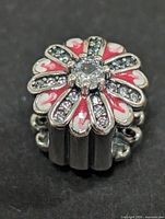 Front view of silver daisy enamel charm bead