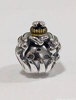 Front view of sterling silver bead charm with yellow accent