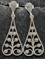 Front view of both earrings showing marcasite stones and design