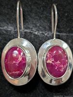 Front view of both earrings showing stones and silver setting
