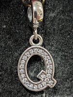 Front view letter Q pendant with pavé CZ