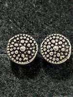 front view of both earrings showing dot pattern
