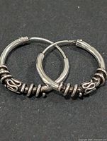 Front view showing both hoops and decorative bead accents