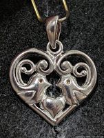 Front view showing full heart shape and bird design