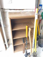 Front view of brown 4-shelf bookshelf