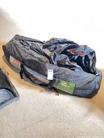 Full view of Coleman carry bag containing tent