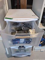 Drawer unit containing assorted electrical hardware