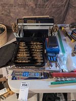 Overview of all bit sets and accessories on table