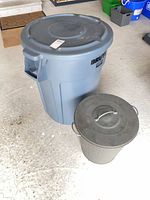 Rubbermaid Brute plastic can and metal garbage can together