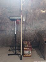 Overall lot showing roller stand, extension pole, and boxed steamer