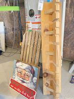 Sled, ski rack and Santa sign grouped together