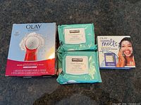 All four unopened facial cleansing products on countertop