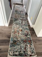 Full length view of the 22' runner rug laid out in hallway