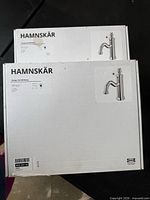 Two sealed IKEA HAMNSKÄR faucet boxes