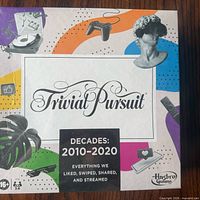 Front of sealed Trivial Pursuit Decades 2010-2020 board game box