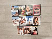 Full set of 11 DVD cases displayed in grid