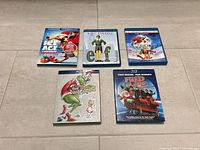 All five Blu-ray cases arranged flat
