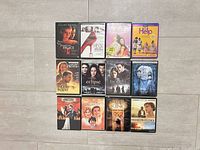 All 12 movie cases laid out in four-by-three grid
