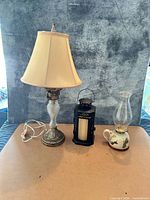 All three lighting items side by side on tabletop