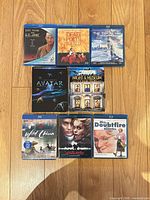 All eight Blu-ray cases laid out showing front artwork