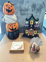 Lot overview showing all four decor items