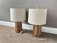 Both driftwood table lamps front view with cords visible