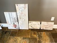 Front view of all four canvases