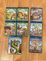 Front view of all Blu-ray cases and Shrek slipcase