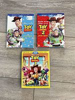 Front covers of all three sealed Toy Story combo packs