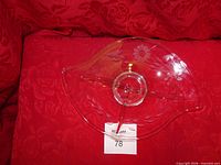 Top view of clear Cornflower pattern glass dish showing three sections and pointed tips