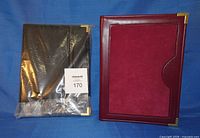 Both planners, black in plastic, wine organizer upright