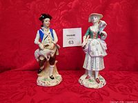 Front view of both figurines