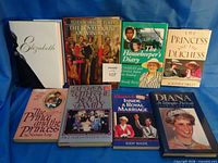 All eight books laid out showing covers