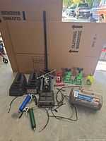 Overall lot with jacks, stands, ramps, air tank, charger and tools