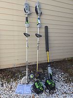 Full lot showing both power units, attachments, batteries, chargers and manuals