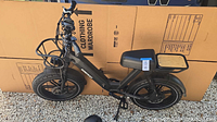 Side profile of Himiway e-bike showing full frame, tires, racks, battery