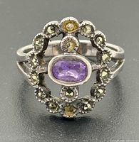 frontal view of ring showing amethyst center and marcasite halo